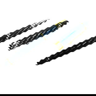 Assorted Pen Trio Featuring a Waterman Fountain Pen: This collection includes two capped ballpoint pens and one uncapped fountain pen with a fine nib. Each pen features a black lacquer finish with gold tone accents and clips. The fountain pen is marked