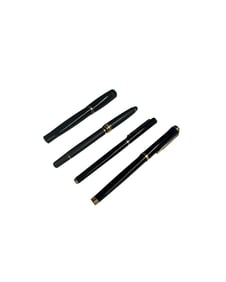 Set of Four Black and Gold Ballpoint Pens, Including Montblanc and Waterman