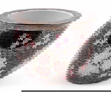 Modern Chinese Black Floral Planter: A large Chinese planter in black, with pink chrysanthemum decor, embellished with gold paint.&nbsp; The inside is decorated with swimming koi fish and the underside is marked Made in China.&nbsp; Meas