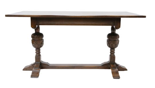 Traditional Provincial French Carved Wood Table: French Provincial carved wood table standing on two decorated legs with an acorn motif. Dimensions: 30 H x 60 W x 30 D inches Condition: some scratches to the wood throughout.
