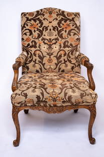 Vintage Baker Chair: A floral-designed vintage Baker's chair with a textured linen material. The legs and arms are carved for a beautiful accent design Dimensions: H 45 x W 29 x D 35 inches Condtition: Signs of age, but g