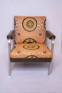 Durango Custom Lounge Chair: A beautifully unique Durang lounge chair that was custom-made for a Dallas residence. It features a vibrant linen upholstery and faux animal skin leather detailing on the base and arms.&nbsp; Dimensio