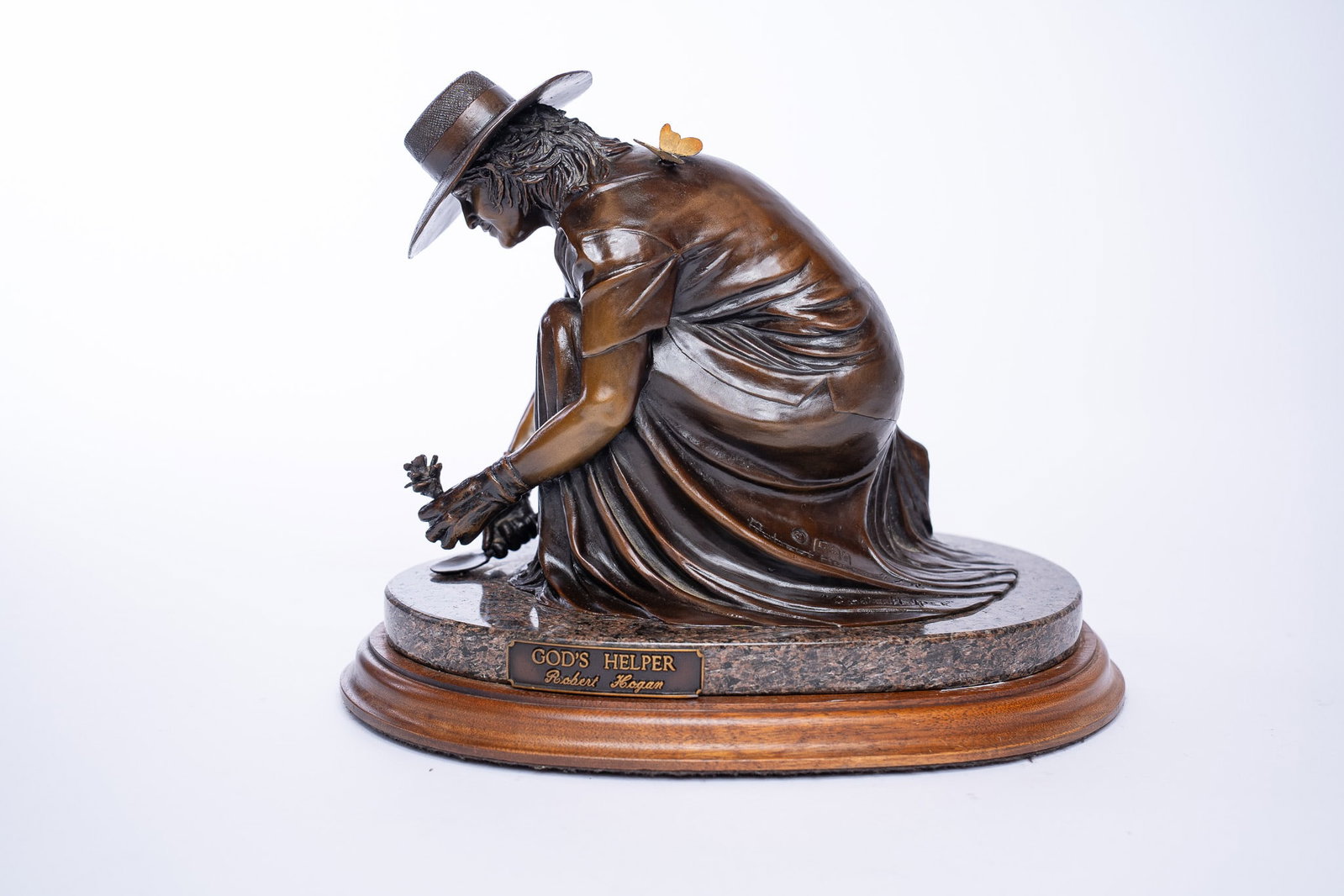 Robert Hogan, American, God's Helper, Bronze Sculpture: A beautiful sculpture by American artist, Robert Hogan. Title: God's Helper Bronze, Signed Robert Hogan - Gods Helper 4/36 Measurements: H 10 W 12 D 10 inches
