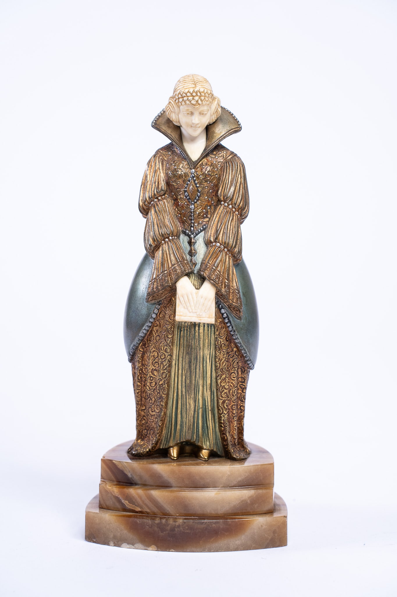 Demetre Chiparus, Romanian, 1886-1947, After Reading, Bronze Sculpture: Demetre Chiparus Romanian 1886-1947 Bronze Sculpture After Reading On brown marble base, Enameled bronze and gilt dress. Engraved - Chiparus - on the marble base. Measurements: H 10 W 4.5 D 4.5 inches