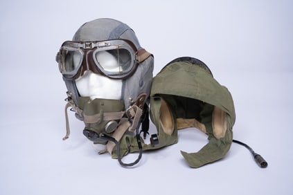 Pair of Fighter Pilot Helmets from Different Eras