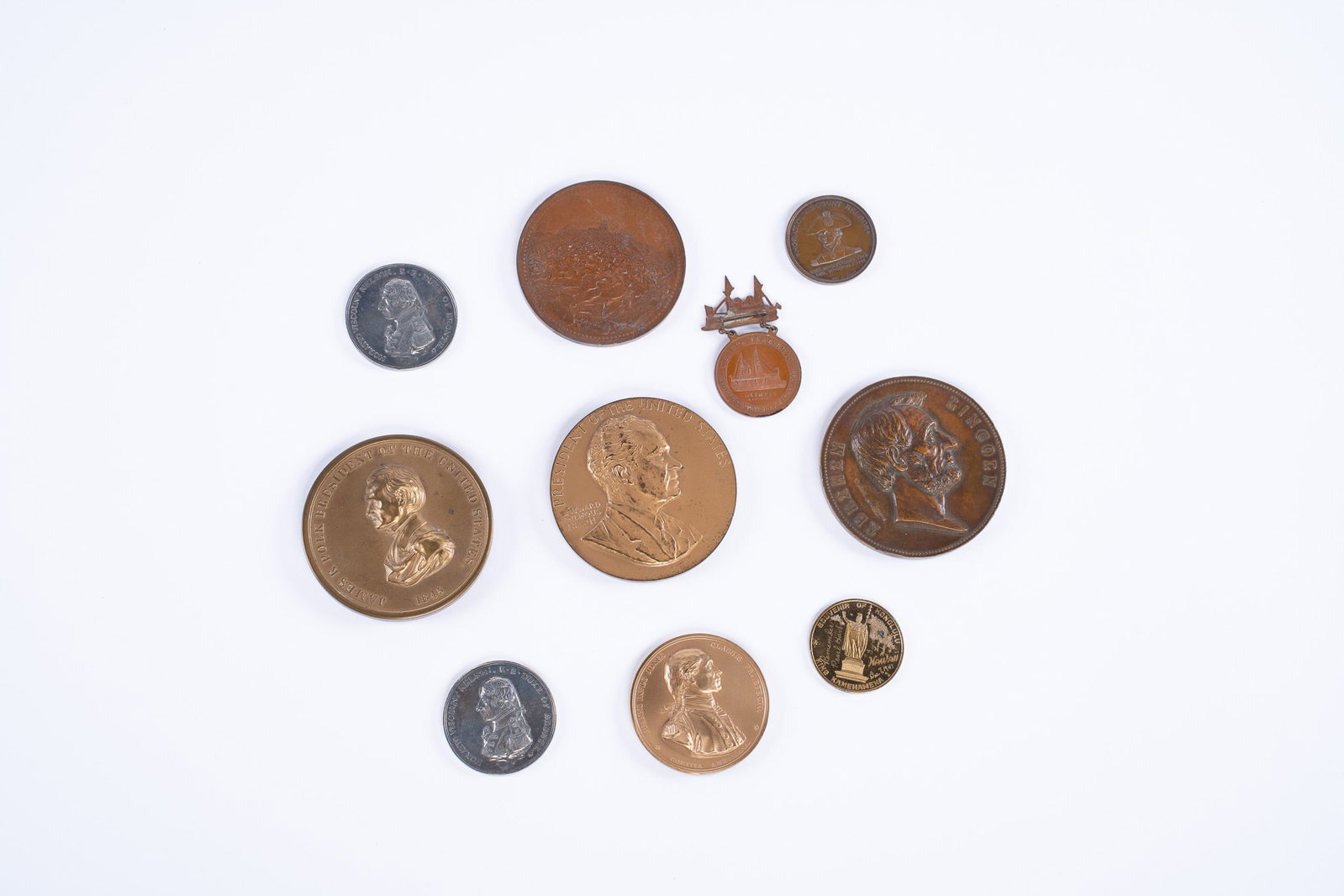 Assortment of Vintage War and Presidential Souvenir Medals and Coins: 1 1845 President James K. Polk Native American Peace and Friendship presidential medal. 1 President Abraham Lincoln presidential medal. 1 1969 President Richard Nixon presidential medal. 1 1905 39th N