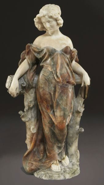 Art Nouveau alabaster sculpture: Art Nouveau alabaster sculpture of a classically dressed maiden holding a book, resting against a blooming tree trunk. Unsigned. 39.5''H, Circa - Early 20th C.