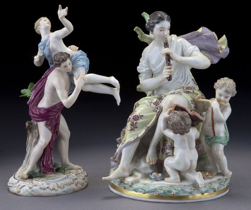(2) Meissen porcelain figural groups: (2) Meissen porcelain figural groups comprising (1) maiden playing a pipe with a pair of putti and (1) depicting the Rape of the Sabine Woman. Cross swords mark in blue underglaze with incised and imp