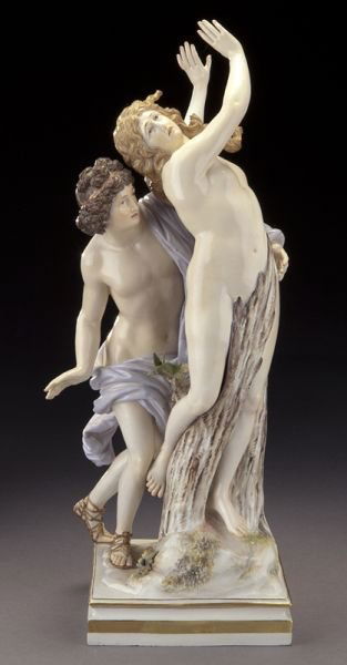 Meissen porcelain figural group with Apollo: Meissen porcelain figural group with Apollo and the wood nymph Daphne transforming into a laurel tree. Cross swords mark in blue underglaze, incised "T9" and impressed "143." Repaired. 14.125"H, Circa