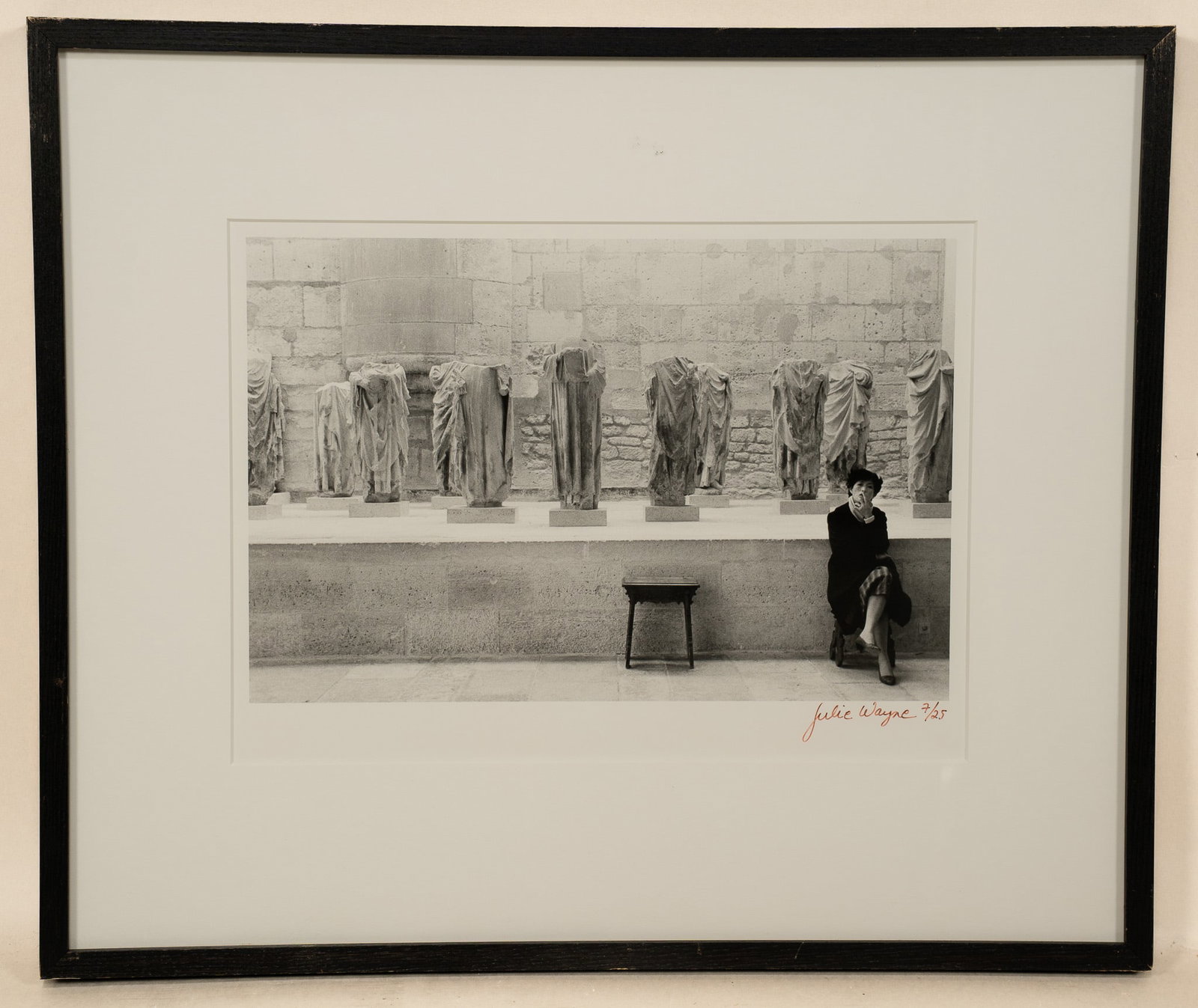 Julie Wayne, American, 1958, Woman With Sculpture, Photograph: Julie Wayne, American, 1958 Woman With Sculpture Photograph, H 10 x W 13.5 x D 1 inches Signed bottom right Black wood frame, H 17.25 x W 20.5 x D 1 inches Condition: Good