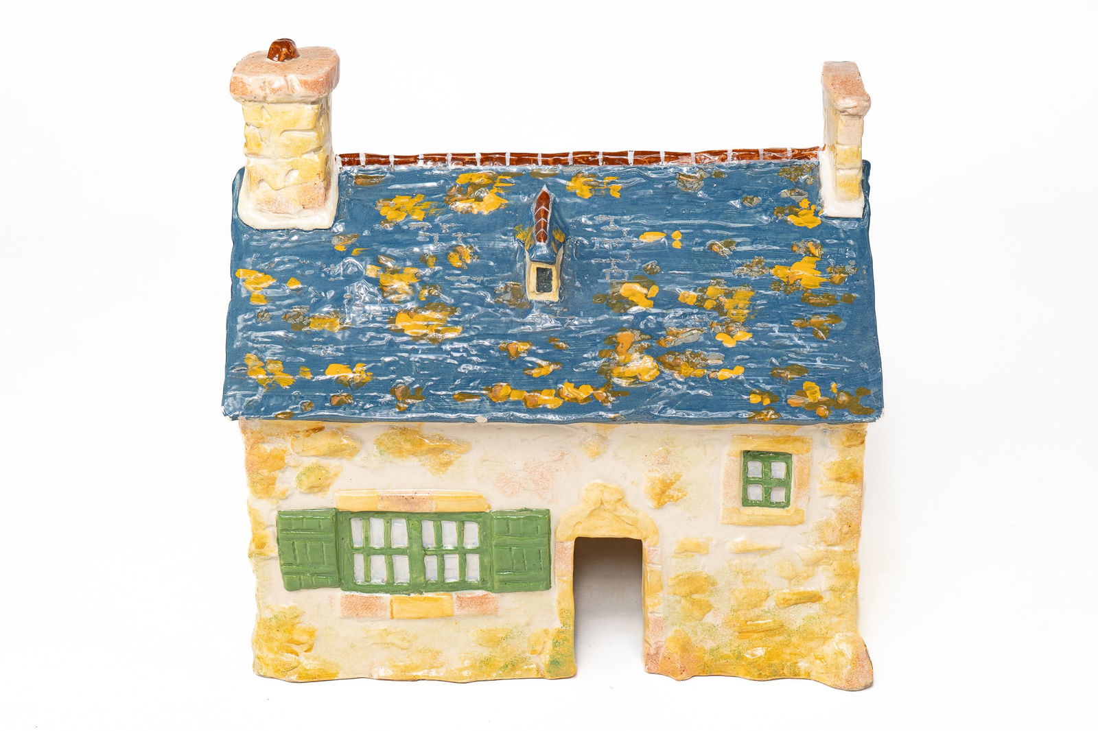 French Faience Sevellec Henriot Quimper House: French Faience Henriot Quimper House. This piece depicts a house with two chimneys, green windows, a blue and yellow roof, and yellow and red bricks. The piece is hollow with an open doorway. Signed H