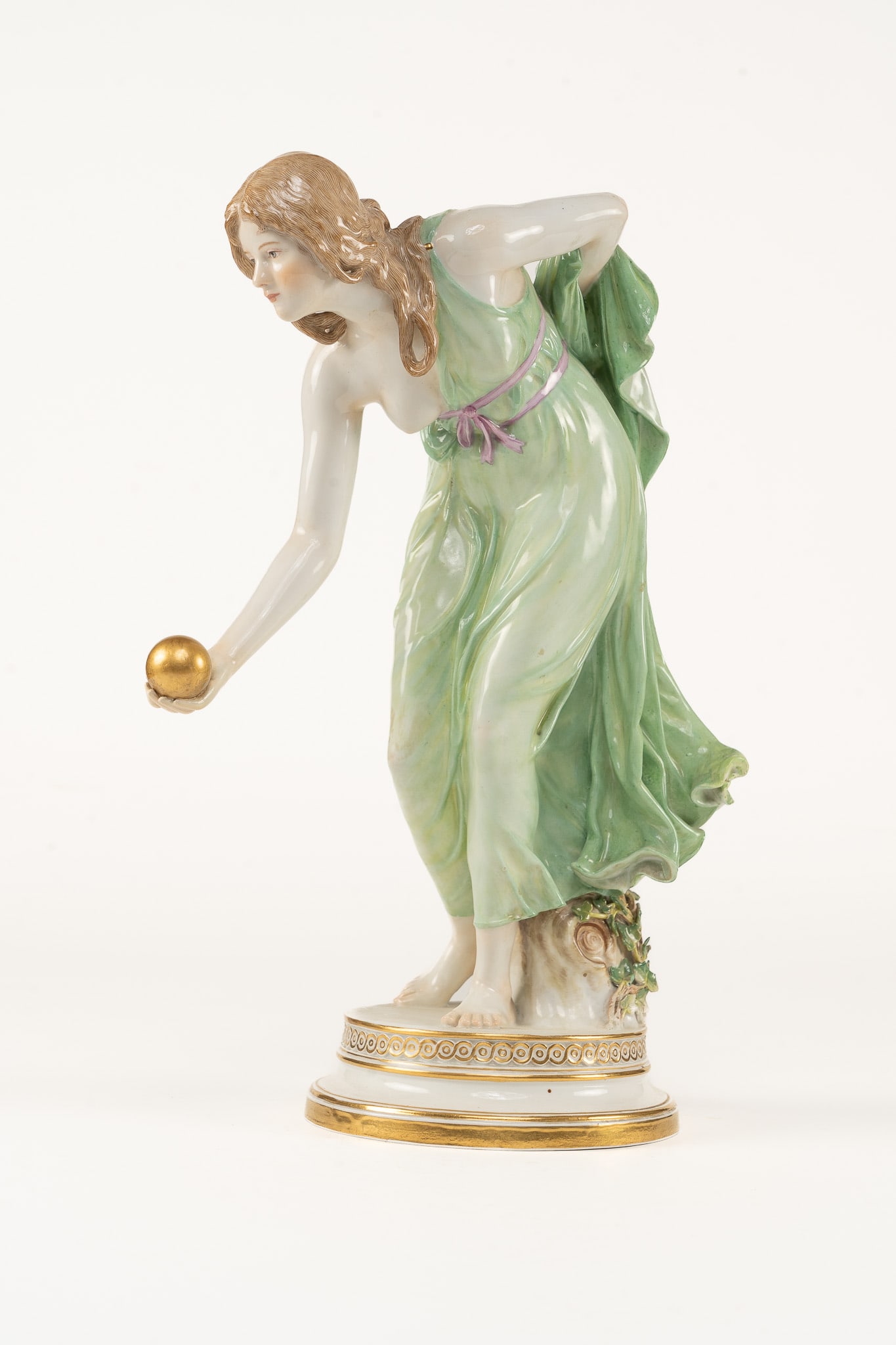 Meissen Porcelain Figurine The Boules Player: Walter Schott for Meissen porcelain figure of a woman, Boule Player. Blue crossed swords mark on the underside. Measuring H 13.5 W 5.5 D 5.5 inches