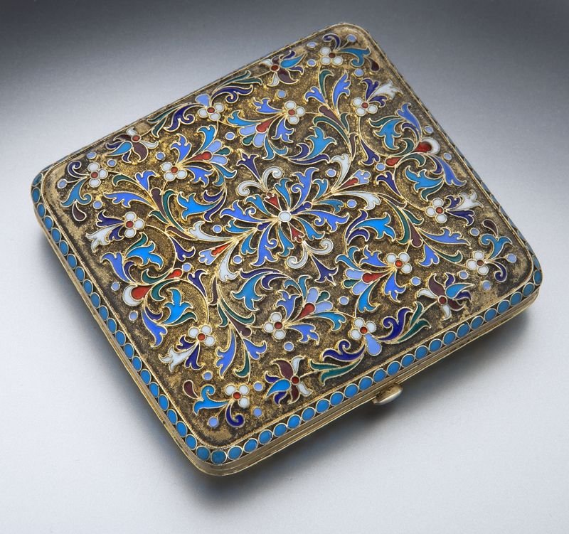 Russian sterling and cloisonne cigarette case: Russian sterling and cloisonne cigarette case with finely scrolled cloisonne decoration to the exterior in blue, cobalt, turquoise, green, white and red, hinging on side with matte silver gilt interio