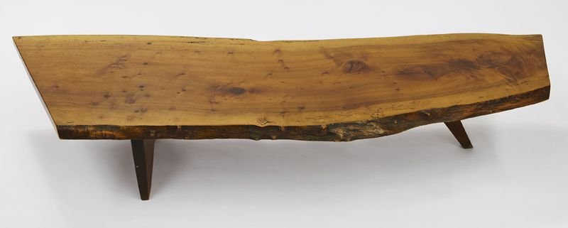 George Nakashima slab coffee table,: George Nakashima slab coffee table, in American black walnut. Note: Accompanied by letter of authenticity signed by the artist's daughter, Mira Nakashima. George Nakashima (American/Pennsylvania, 1905