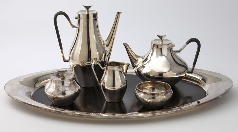 John Prip for Reed and Barton silver plate tea set: John Prip for Reed and Barton silver plate tea set the "Denmark" pattern tea and coffee service comprising a teapot, coffee pot, creamer, covered sugar bowl, waste bowl, and tray. Coffee pot: 10''H; t
