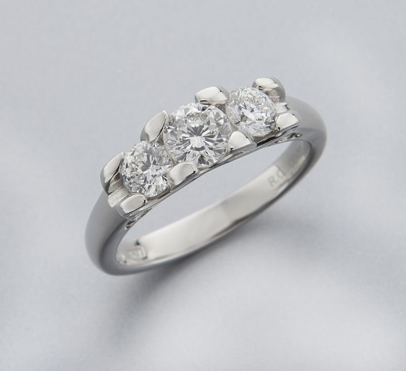 Roberto Coin platinum and diamond ring: Roberto Coin platinum and diamond ring featuring three round "Cento" cut diamonds, .96 cts. approximate total, H color, VS2-SI1 clarity, mounted in platinum, also mounted on the underside with Roberto