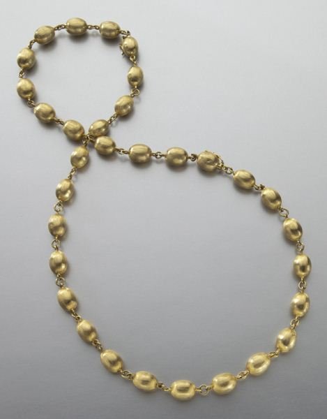 Italian 18K gold necklace/bracelet conversion,: Italian 18K gold necklace/bracelet conversion, featuring a 7.5" bracelet of brushed melon shaped balls joined by chain. The bracelet attaches to a 15" necklace of like design to convert to a 22.5" nec