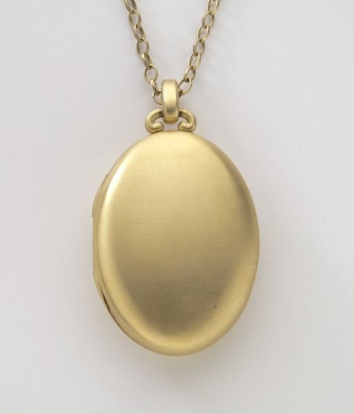 Monica Rich Kosann 18K gold locket necklace: Monica Rich Kosann 18K gold locket necklace with a satin finish, allowing for four photographs, in 18K yellow gold. Stamped, "750 Germany M." 40.3 grams. Provenance: The estate of a gentleman, Dallas,