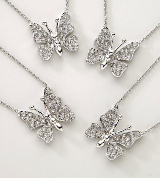 (4) Roberto Coin 18K gold, diamond butterfly: (4) Roberto Coin 18K gold, diamond butterfly pendants, each mounted with 28 round brilliant cut diamonds, .24 cts. approximate total each, G-H color, SI clarity, in 18K white gold with an 18K white go
