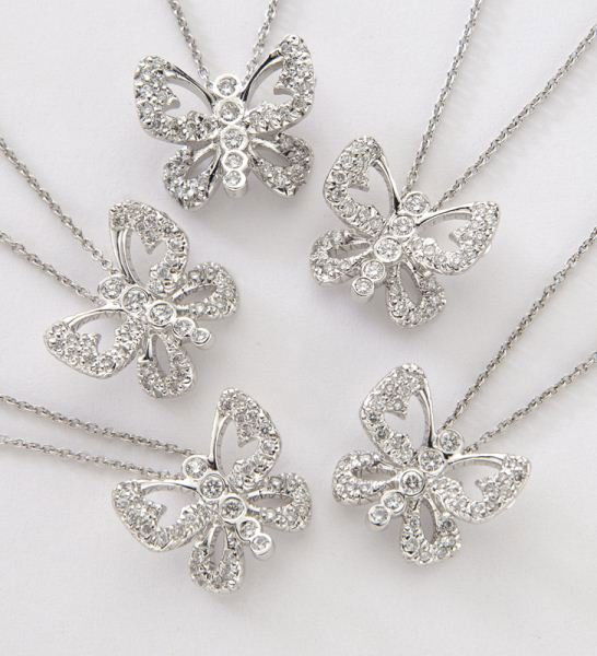 (5) Roberto Coin 18K and diamond necklaces: (5) Roberto Coin 18K and diamond necklaces in butterfly form, each having 37 round brilliant cut diamonds, .38 cts. approximate total each, G-H color, VS2-SI1 clarity, mounted in 18K white gold and on