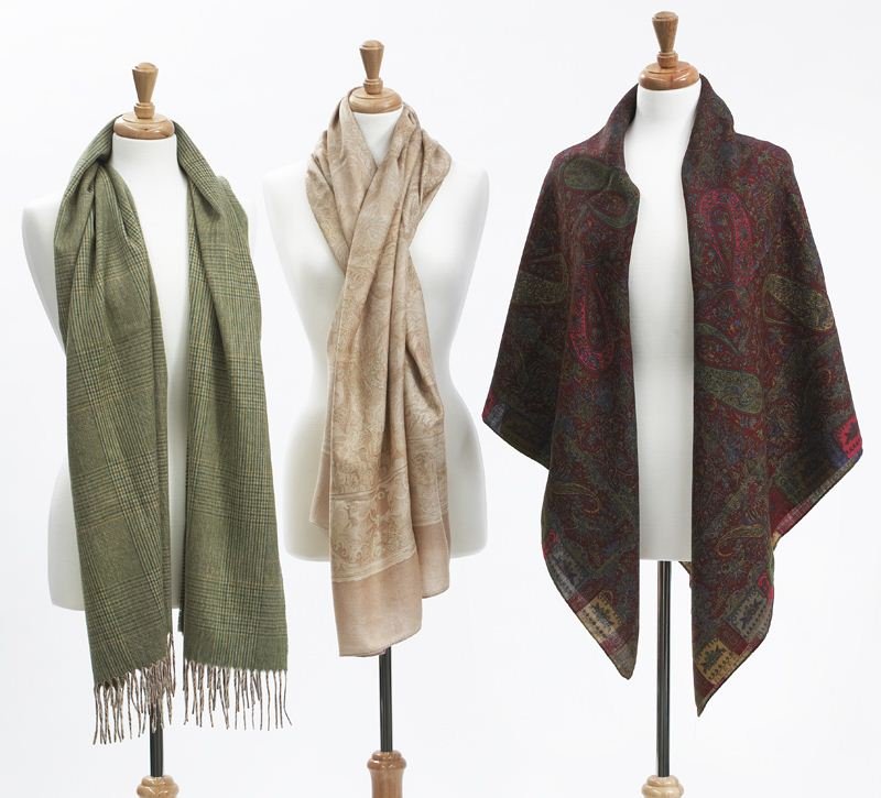 (2) Loro Piano scarves and (1) Etro wrap: (2) Loro Piano scarves and (1) Etro wrap in red tones with no tag; the first Loro Piano of green and tan Glen Plaid, the second of 60% silk and 40% cashmere in a tan floral motif. The plaid: 72"L x 17