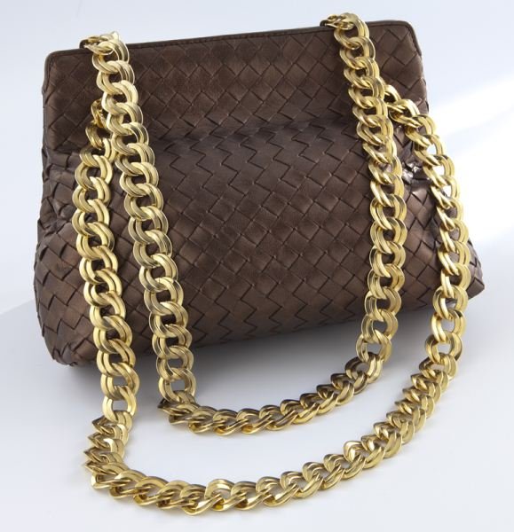 Bottega Veneta bronze woven leather shoulder bag: Bottega Veneta bronze woven leather shoulder bag with two chain shoulder straps. 7''H x 9.75''W, Circa - Late 20th C.