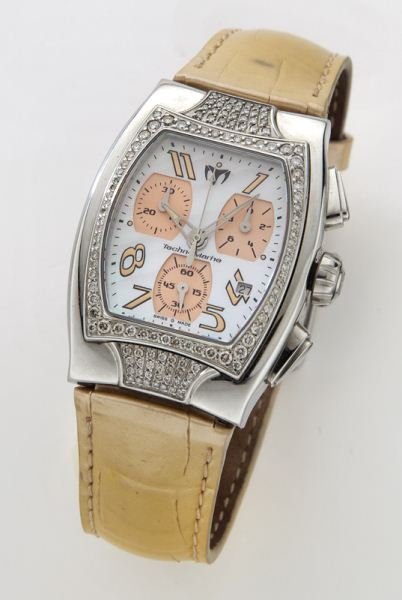 Women's TechnoMarine TechnoSquare Chronograph: Women's TechnoMarine TechnoSquare Chronograph watch with a diamond bezel, a stainless steel case, a mother-of-pearl dial with pale pink accents, and a pearlized pale pink leather band. Circa - Late 20
