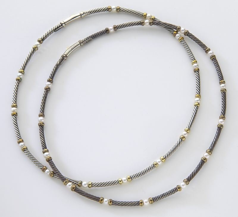 (2) David Yurman 14K, sterling and cultured pearl: (2) David Yurman 14K, sterling and cultured pearl cable necklaces. Stamped, "DY." 40.3 grams total weight. Provenance: The estate of a gentleman, Dallas, Texas. 15''L, Circa - Contemporary.