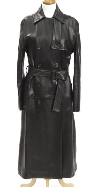 Celine size 38 black leather trench coat: Celine size 38 black leather trench coat with double-breasted button closure and belted waist, measuring 46" long, the sleeves 24" long each. Circa - Contemporary.