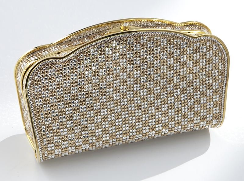 Judith Leiber white and gold crystal minaudiere: Judith Leiber white and gold crystal minaudiere of gold tone metal in box form with shaped edge, decorated in Austrian crystals, the interior of gold leather with metal shoulder strap, original mirror