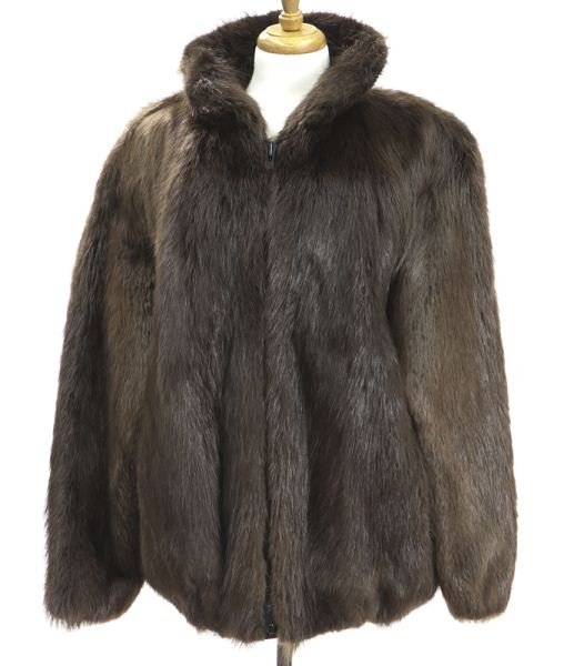 Gentleman's long-haired beaver fur coat: Gentleman's long-haired beaver fur coat with zipper closure to the front, measuring 25.75" long from the collar, the sleeves measuring 27" long each, bearing a label for "Made in Canada." Circa - Late