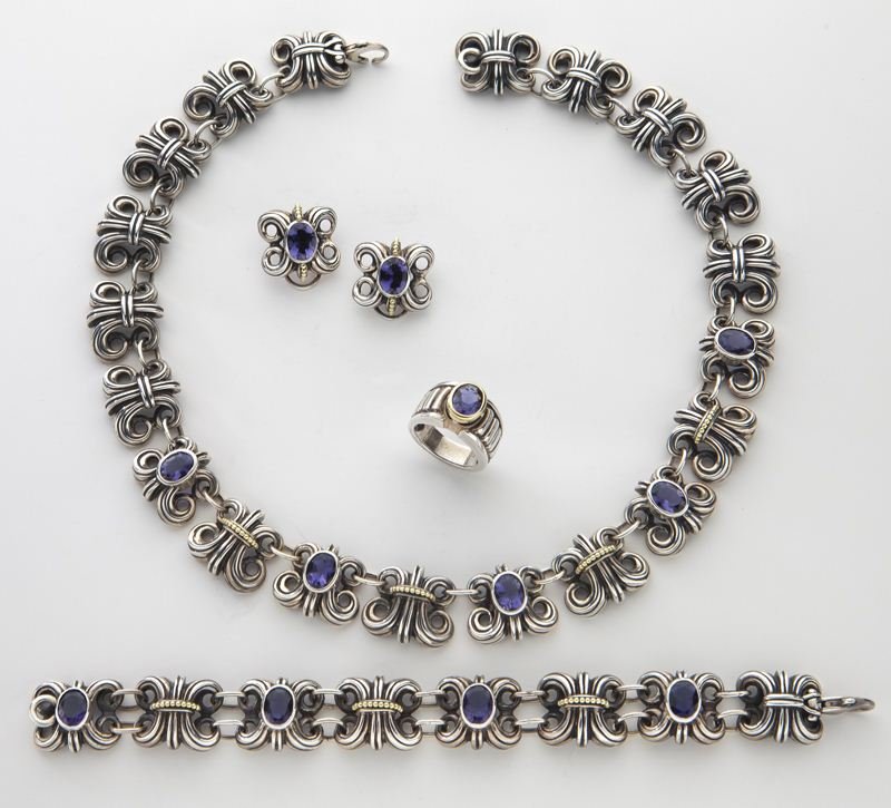 4 Pcs. Lagos 18K, sterling silver, iolite jewelry: 4 Pcs. Lagos 18K, sterling silver, iolite jewelry in the "Wheat" pattern, comprising: (1) necklace, 17''L; (1) bracelet, 7.25''L; (1) pair of earrings; and (1) ring, size 6. Stamped, "Caviar 750 925."