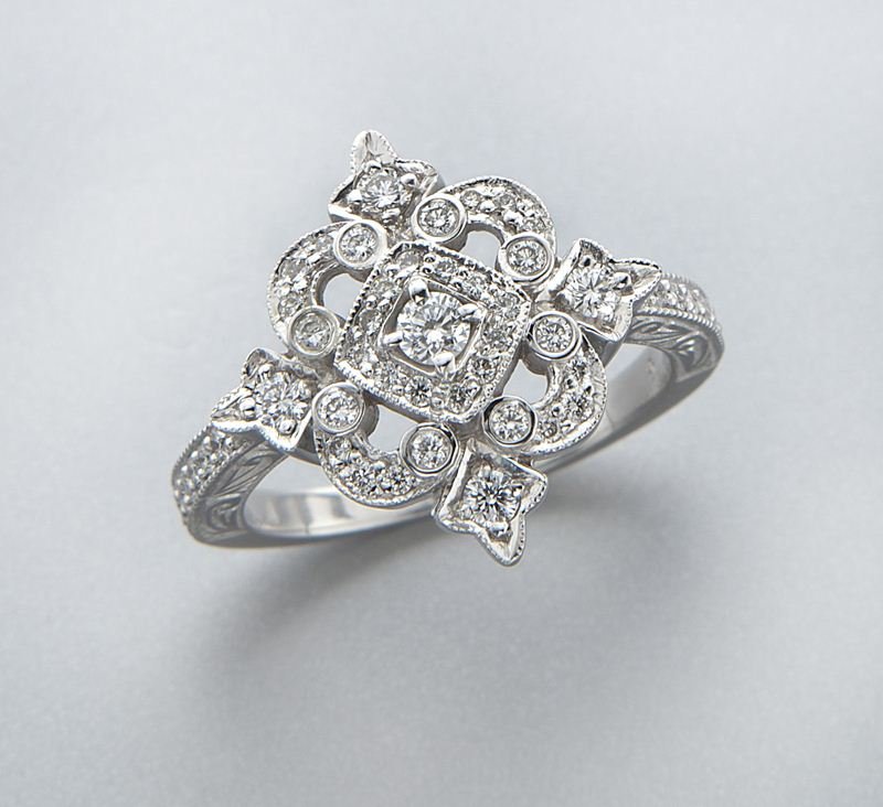 Penny Preville 18K gold and diamond ring: Penny Preville 18K gold and diamond ring with 49 round brilliant cut diamonds, in an 18K white gold mount. Stamped, "PP." 5.8 grams. Provenance: The estate of a gentleman, Dallas, Texas. Size 6, Circa