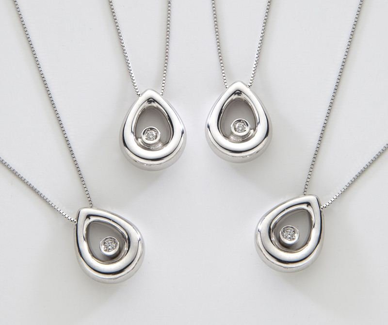 (4) Roberto Coin 18K and diamond teardrop pendants: (4) Roberto Coin 18K and diamond teardrop pendants each mounted with a single round brilliant cut diamond, in 18K white gold. Stamped, "18Kt Italy 750" and bears Roberto Coin Italian hallmark. 1.7 gra