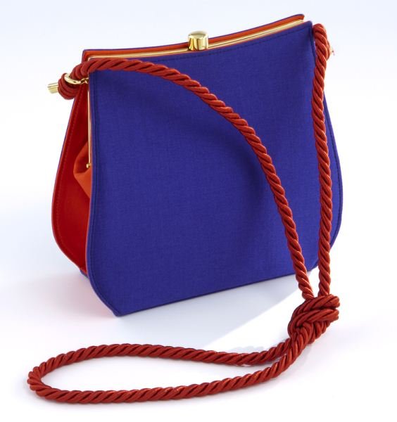 Escada blue and red silk handbag: Escada blue and red silk handbag with red silk cord shoulder strap, hinged gold tone clasp to the top, one slip pocket to the red silk interior, new with tag. 6.925"H x 7.25"W, Circa - 2000's.