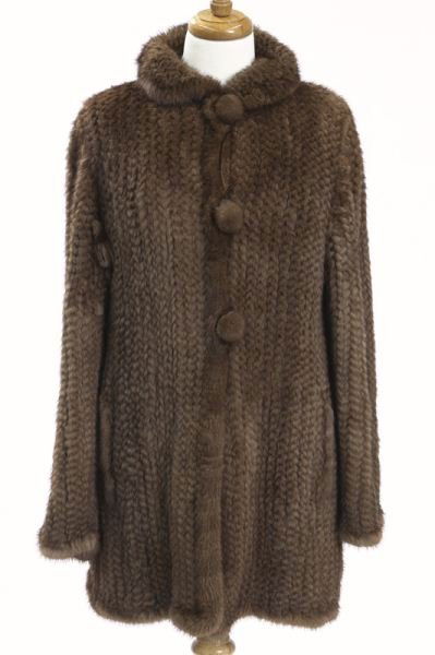 Knitted brown mink fur sweater: Knitted brown mink fur sweater with fur button closures to the front, measuring 29.25" long from the collar, the sleeves 24" long each, with pulls to the sweater, especially under the arms. Circa - Co