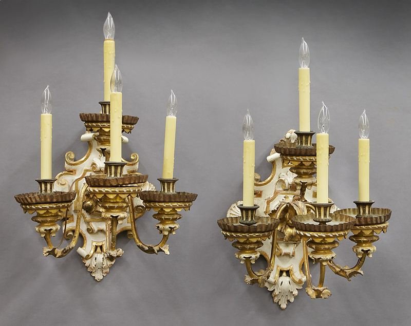 Pr. Italian Roccoco style giltwood sconces,: Pr. Italian Roccoco style giltwood sconces, formed with four scrolled arms anchored to a gilt and creme peinte backplate carved with scrolled flourishes and acanthine details. Later electrified. Back 
