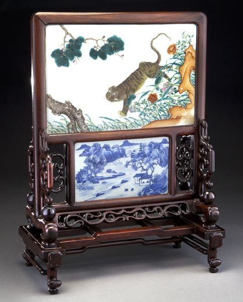 Chinese Qing porcelain inset rosewood table screen: Chinese Qing porcelain inset rosewood table screen the top plaque depicting a tiger in a landscape, 10"H x 15"W, the bottom a blue and white porcelain plaque depicting a landscape, 5.5"H x 9.5"W, Over