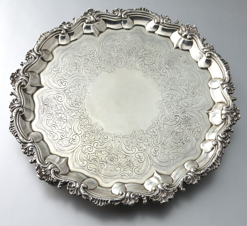 George III sterling Timothy Renou salver: George III sterling Timothy Renou salver with floral and scroll decoration to the body and scrolled border, supported by four scroll feet. Marked for Timothy Renou, London, sterling, 1798. 43.975 ozt.
