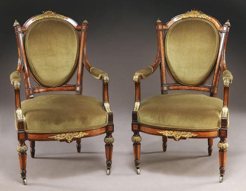 Pr. Napoleon III Alexandre Pihouée armchairs,: Pr. Napoleon III Alexandre Pihouée armchairs, made in Paris, of rosewood and satine, ormolu mounted frame with allover feather inlaid satine trim, green velour upholstered medallion back and seat, ra