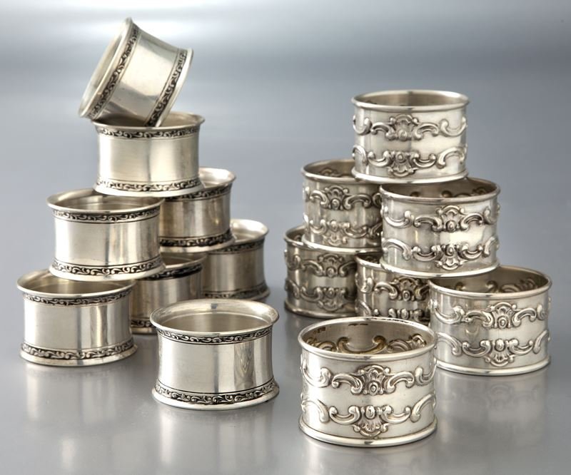 (15) American sterling napkin rings: (15) American sterling napkin rings comprising (8) marked for Wallace sterling silver, and (7) for Gorham. 13.155 ozt. total weight. Circa - Mid 20th C.