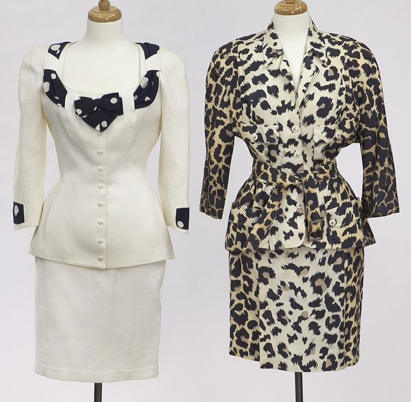 (2) Thierry Mugler skirt suits: (2) Thierry Mugler skirt suits (1) of white pique cotton with polka dot scarf detail to the portrait collar, size 38; (1) of a blue and white leopard print with belted jacket, size 40. Each tag marked
