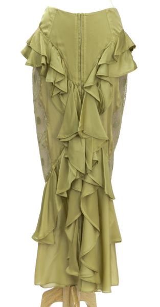 Yves St. Laurent green silk evening skirt: Yves St. Laurent green silk evening skirt with twin ruffled panels to front and back of the mermaid style charmeuse skirt, exposed zipper closure to the back. Tag marked Yves Saint Laurent, au Rive Ga