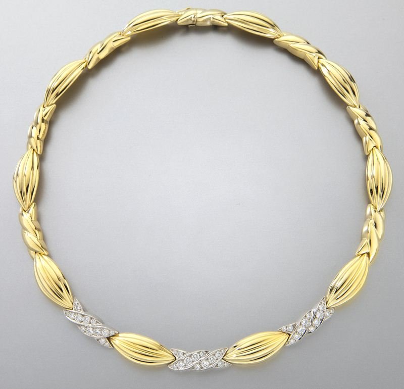 Charles Turi 18K gold and diamond necklace: Charles Turi 18K gold and diamond necklace featuring 42 round brilliant cut diamonds, 1.88 cts. approximate total mounted in 18K white and yellow gold. Stamped, "Turi 18K." 71.2 grams. 15"L, Circa - 2