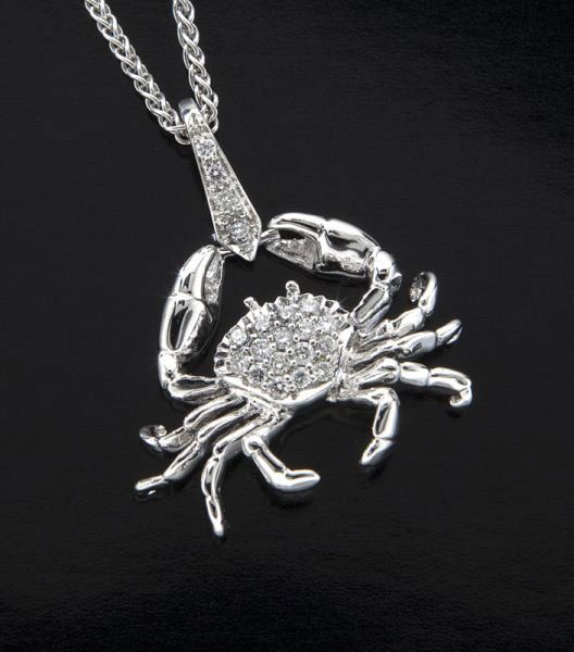 Stephen Webster 18K gold and diamond necklace: Stephen Webster 18K gold and diamond necklace in the form of a crab on 18K white gold chain. Stamped, "18K SW631." 7.7 grams. Provenance: The estate of a Gentleman, Dallas, Texas. 17"L, Circa - 20th C