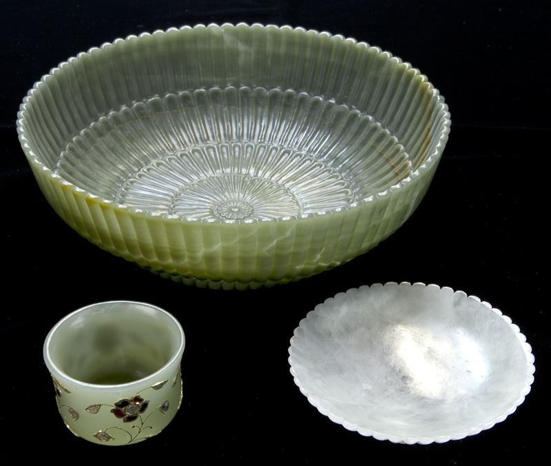 (3) Mughal style jade carvings.: (3) Mughal style jade carvings. (2) foliated dishes, larger: 8.5" Dia., smaller: 4" Dia.; (1) rough cut diamond and glass studded cup, 1.5"H x 2.25" Dia., Circa - 20th C.