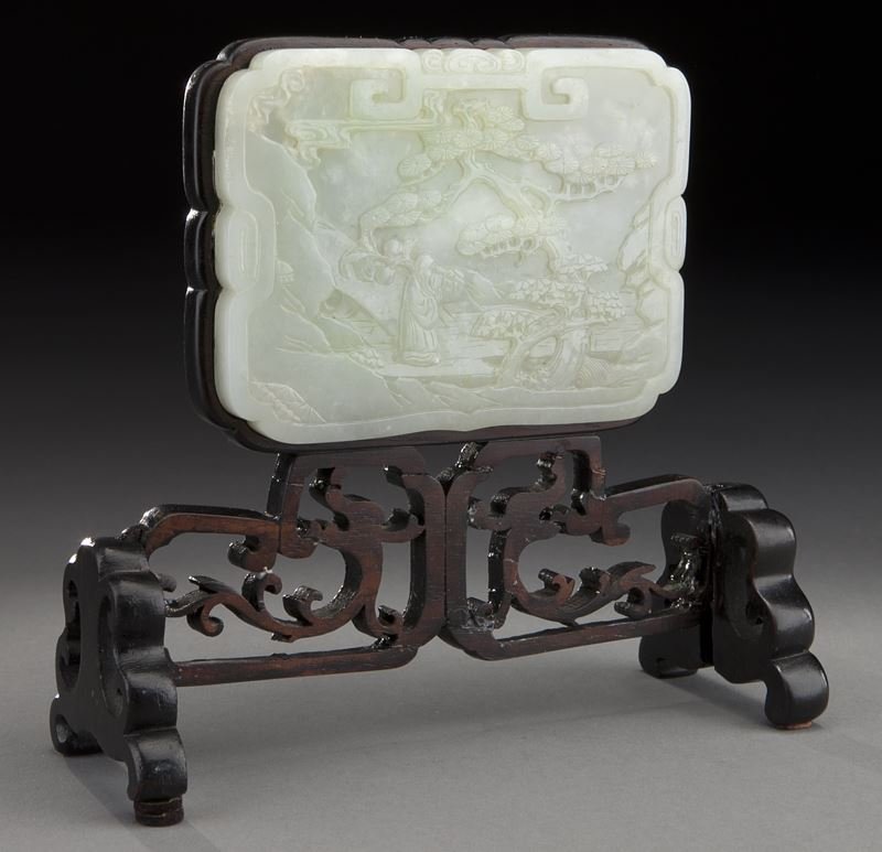 Chinese Qing carved jade plaque mounted table: Chinese Qing carved jade plaque mounted table screen, the carved jade plaque depicting the God of Longevity in a landscape. Plaque: 3.25"H x 4.5"W; Overall: 6"H x 6.75"W, Circa - 19th C.