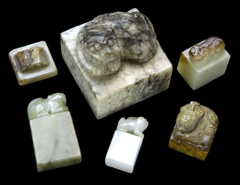 (6) Chinese Qing carved jade seals.: (6) Chinese Qing carved jade seals. (3) of square form; (3) of rectangular form. Provenance: From the collection of a prominent Northern California collector. Largest: 2.25"H x 2.25"W. Circa - Qing dy