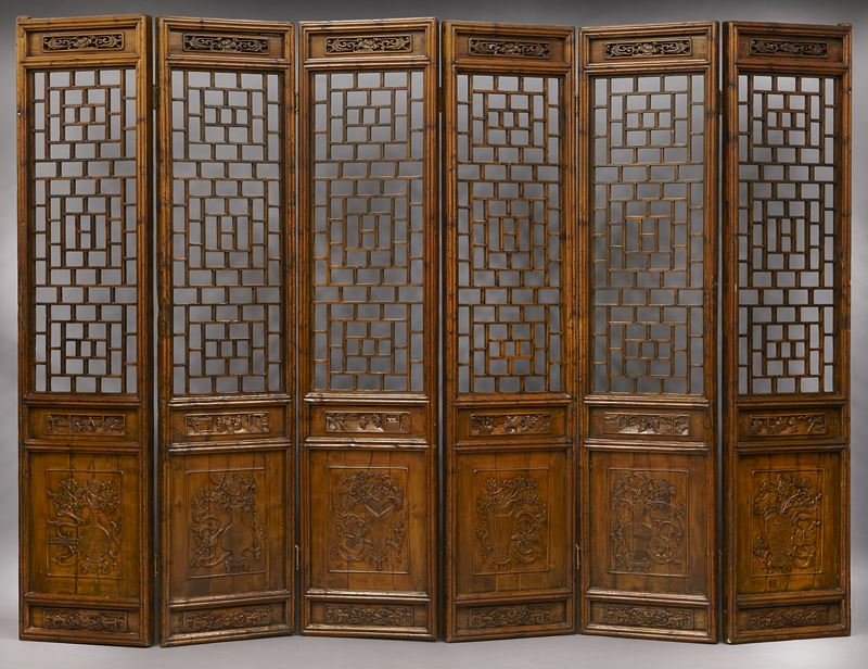 Chinese Six-panel carved wood screen,: Chinese Six-panel carved wood screen, the top panel carved with chrysanthemum and flowers, with the longest panel of reticulated geometric pattern, a carved panel depicting figures in a landscape, and