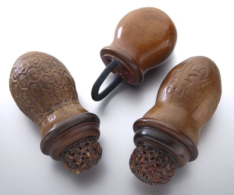 (3) Chinese late Qing molded gourd cricket cages: (3) Chinese late Qing molded gourd cricket cages with tapered bottom form and open work lids in various material. Provenance: From the collection of a prominent Northern California collector. Largest 